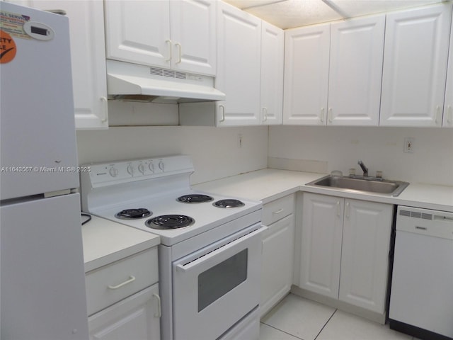 17530 NW 68th Ave Unit C4002, Hialeah, FL 33015 - kitchen featuring white appliances, under cabinet range hood, a sink, white cabinets, and light countertops