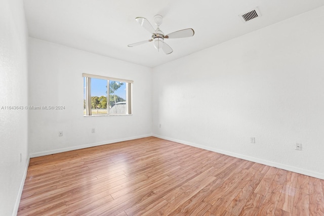 spare room with ceiling fan and light hardwood / wood-style floors