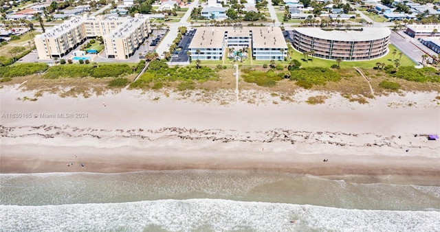 drone / aerial view with a water view and a city view