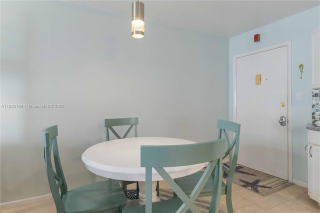 dining room featuring light tile patterned floors