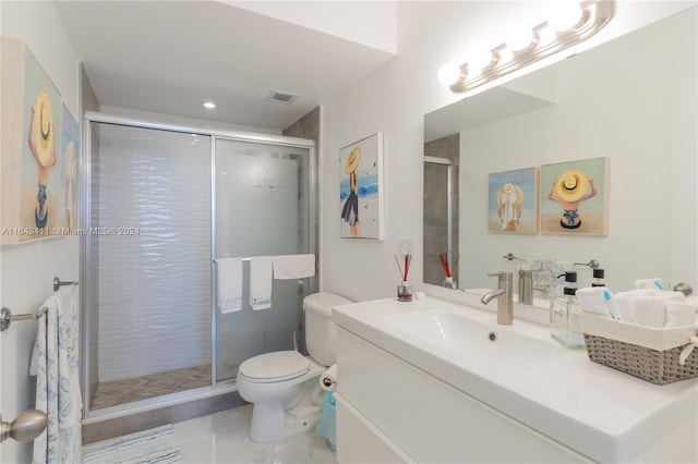 bathroom with tile patterned flooring, toilet, an enclosed shower, and vanity