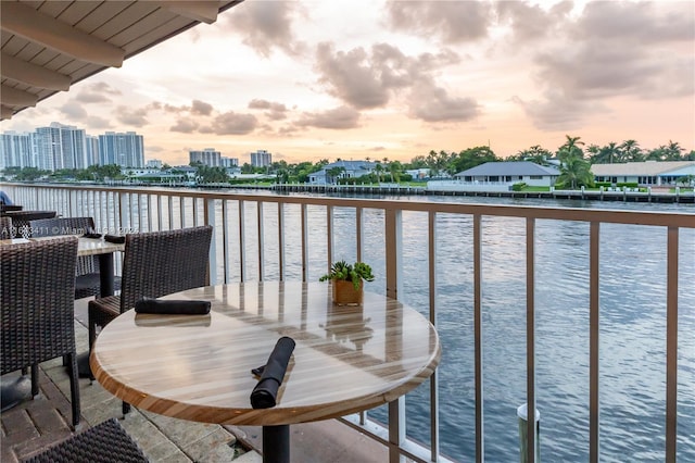 view of balcony at dusk