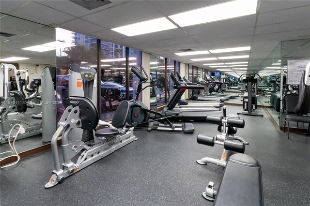 gym with a drop ceiling