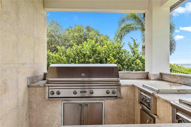 view of patio / terrace with exterior kitchen and area for grilling