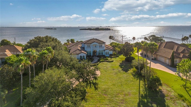 birds eye view of property featuring a water view