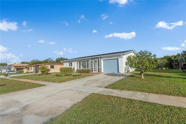 ranch-style house featuring a front lawn and a garage