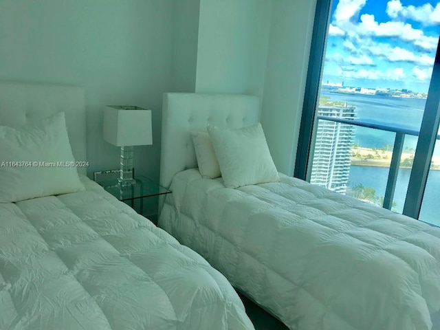 bedroom with a water view