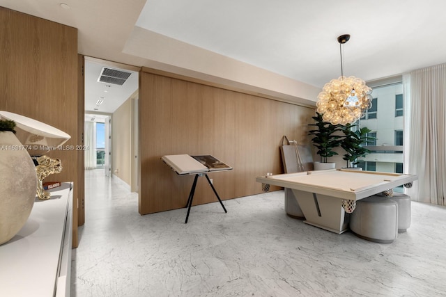 recreation room featuring a notable chandelier, pool table, and a wealth of natural light