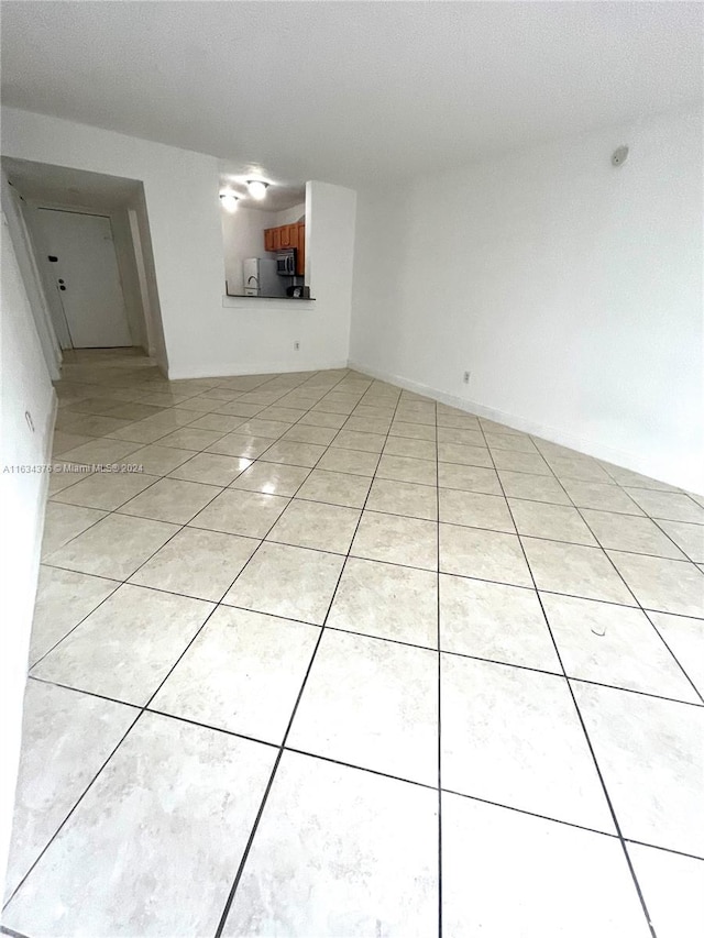 interior space with light tile patterned floors