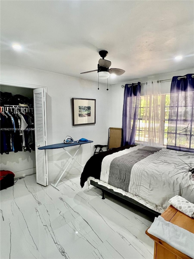 bedroom featuring a closet and ceiling fan