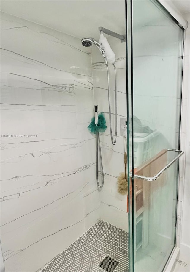 bathroom with an enclosed shower