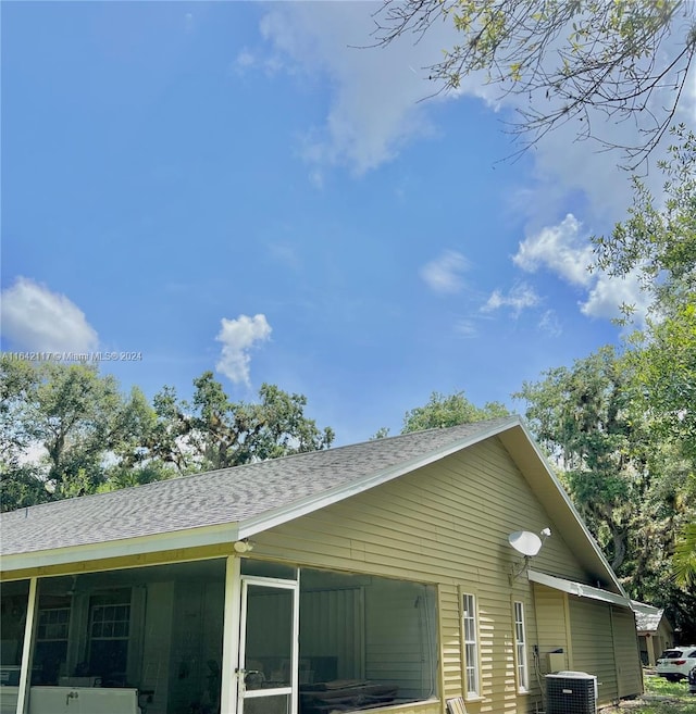 view of home's exterior featuring central AC