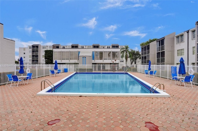 view of pool featuring a patio