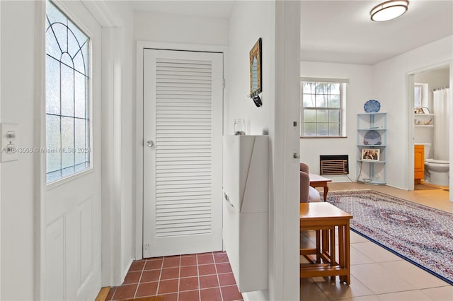 foyer entrance featuring tile patterned floors