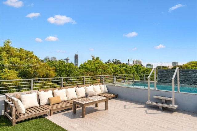 view of patio featuring a pool side deck and outdoor lounge area