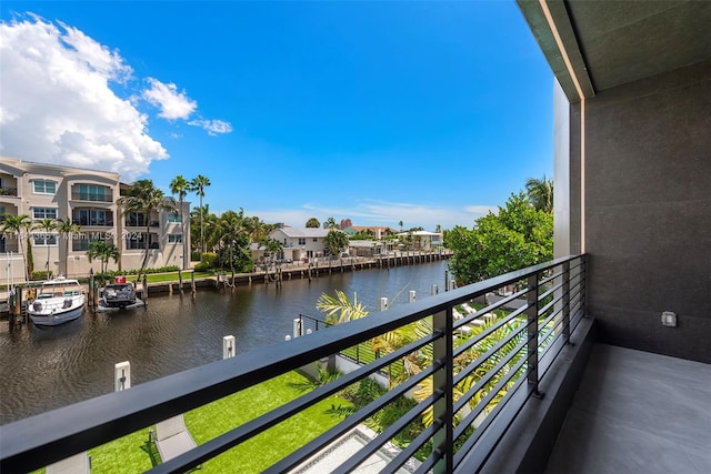 balcony featuring a water view