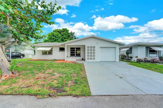 ranch-style home with a garage and a front yard