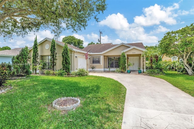 single story home with a garage and a front yard