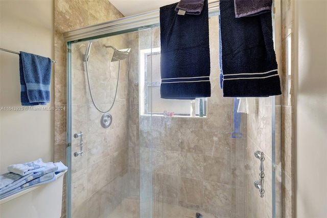 bathroom with an enclosed shower