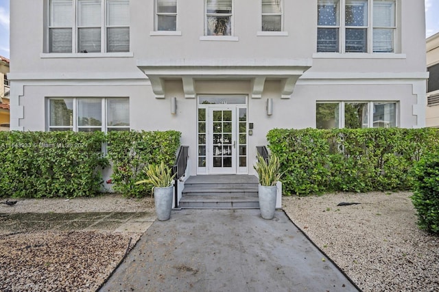 doorway to property featuring french doors