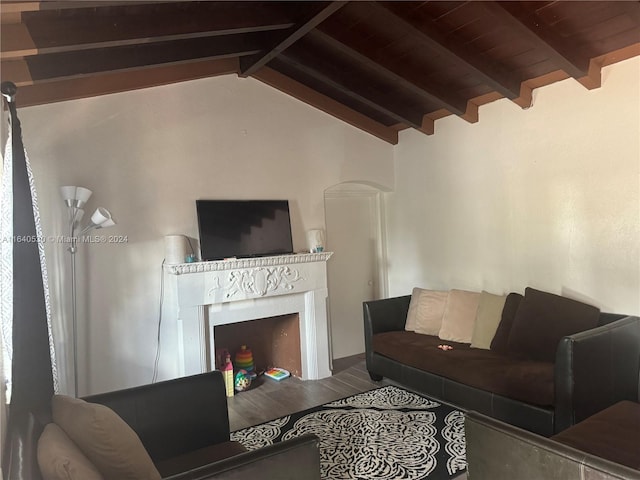 living room with lofted ceiling with beams, wood ceiling, and wood-type flooring