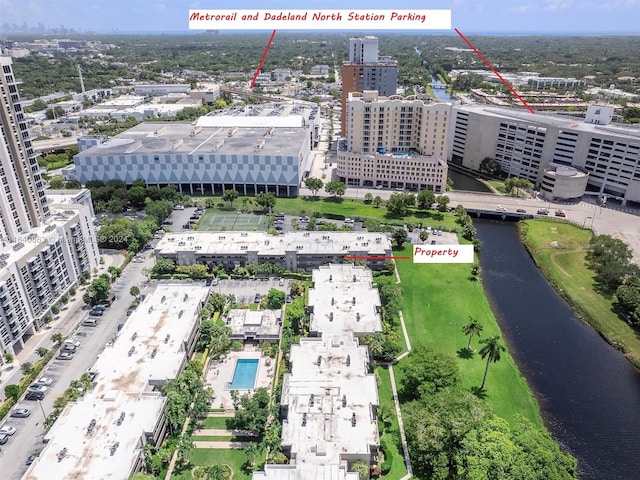 birds eye view of property featuring a water view