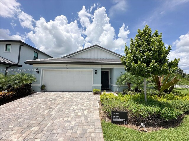 view of front of property with a garage