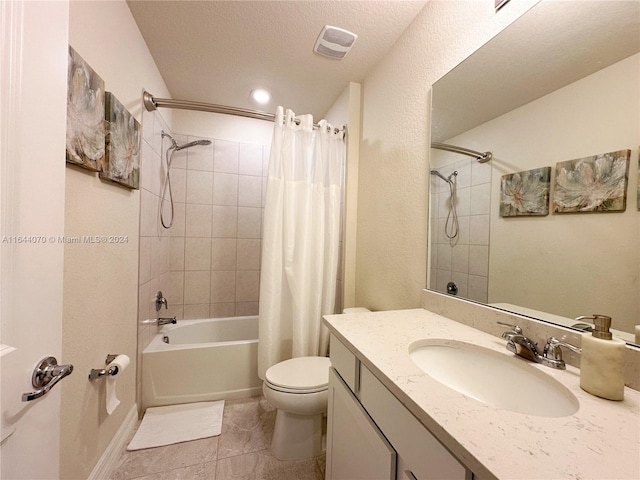 bathroom with shower / tub combo with curtain, visible vents, toilet, a textured ceiling, and vanity