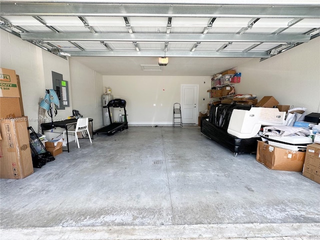 garage featuring a garage door opener and electric panel