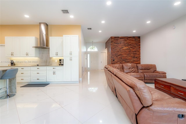 living room with light tile patterned floors