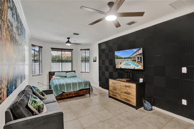 bedroom featuring ceiling fan and ornamental molding