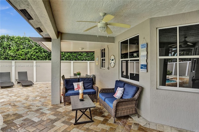 view of patio / terrace with an outdoor hangout area and ceiling fan