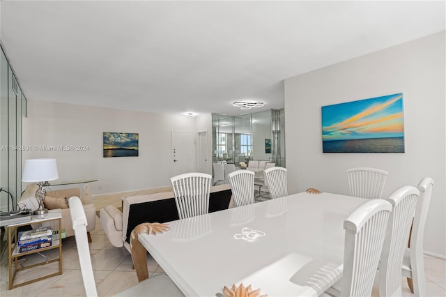 dining room with light tile patterned floors