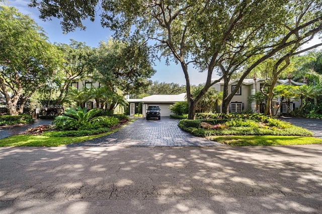 view of front of property with decorative driveway