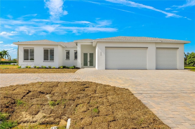 view of front of home with a garage