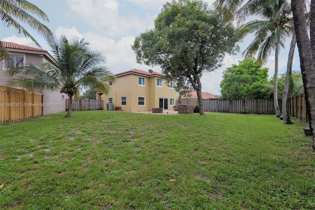 view of yard featuring central AC