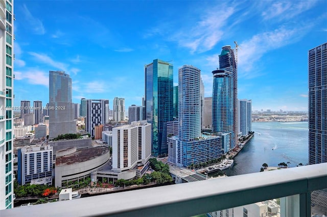 property's view of city featuring a water view