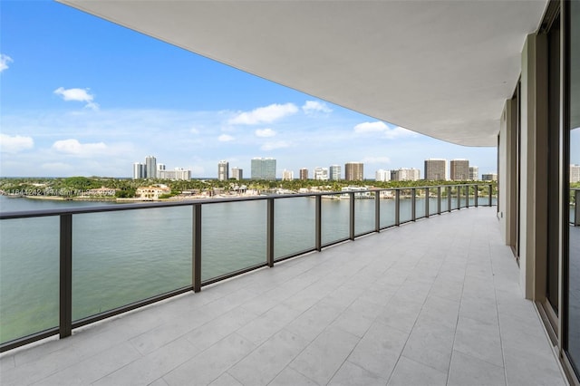 balcony featuring a water view