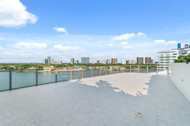 view of patio with a water view