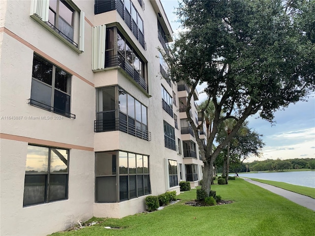 view of building exterior featuring a water view