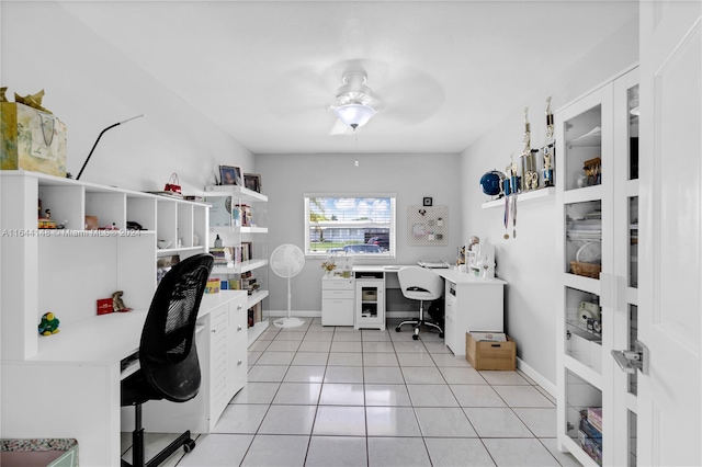 office featuring ceiling fan and light tile patterned flooring