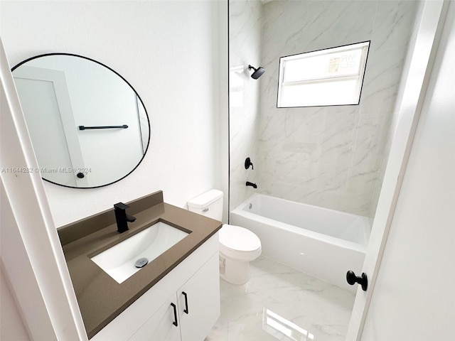 full bathroom with toilet, tiled shower / bath combo, and vanity