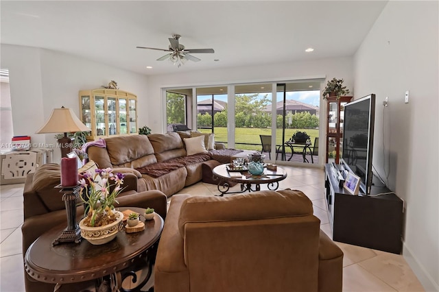 living area featuring light tile patterned floors, recessed lighting, and a ceiling fan