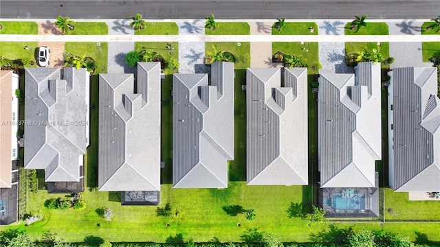 birds eye view of property with a residential view