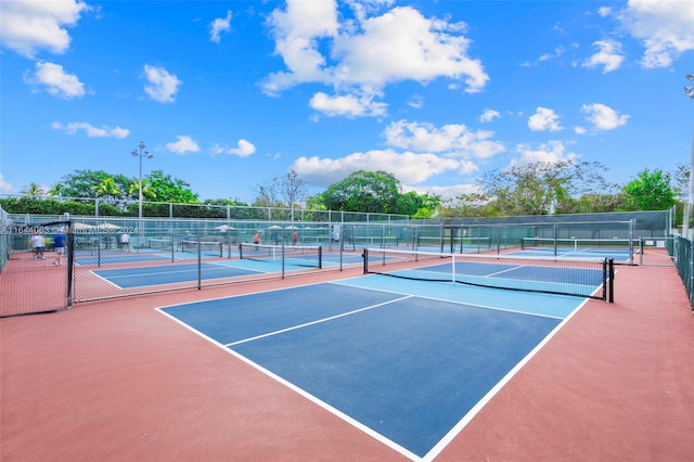 view of sport court featuring basketball hoop