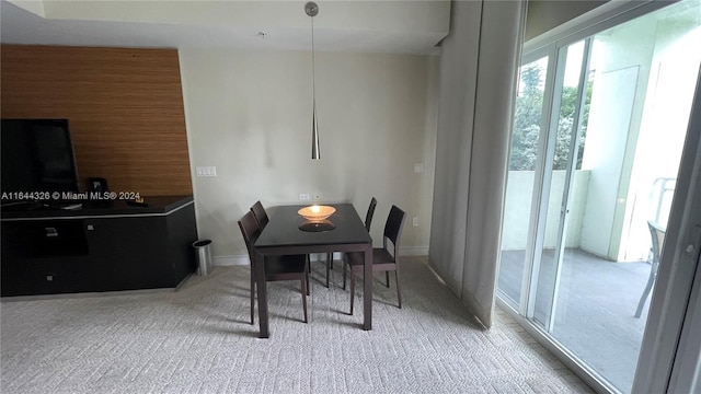 view of carpeted dining area