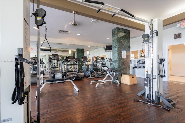 gym featuring hardwood / wood-style floors