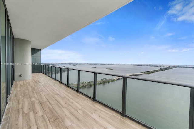 balcony featuring a water view