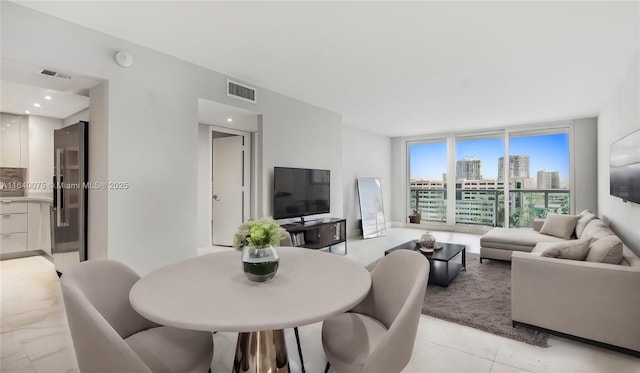 living room with floor to ceiling windows