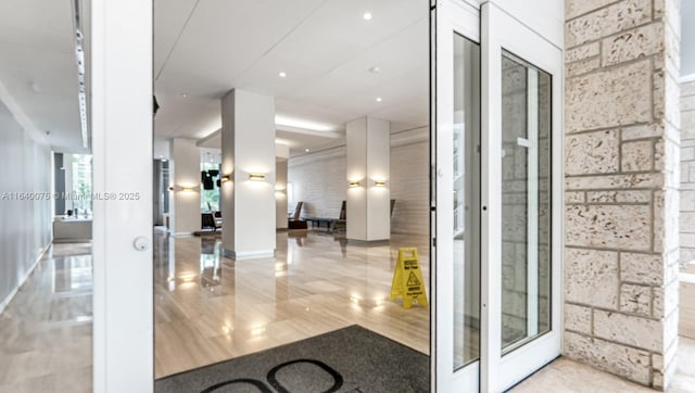 property entrance featuring french doors